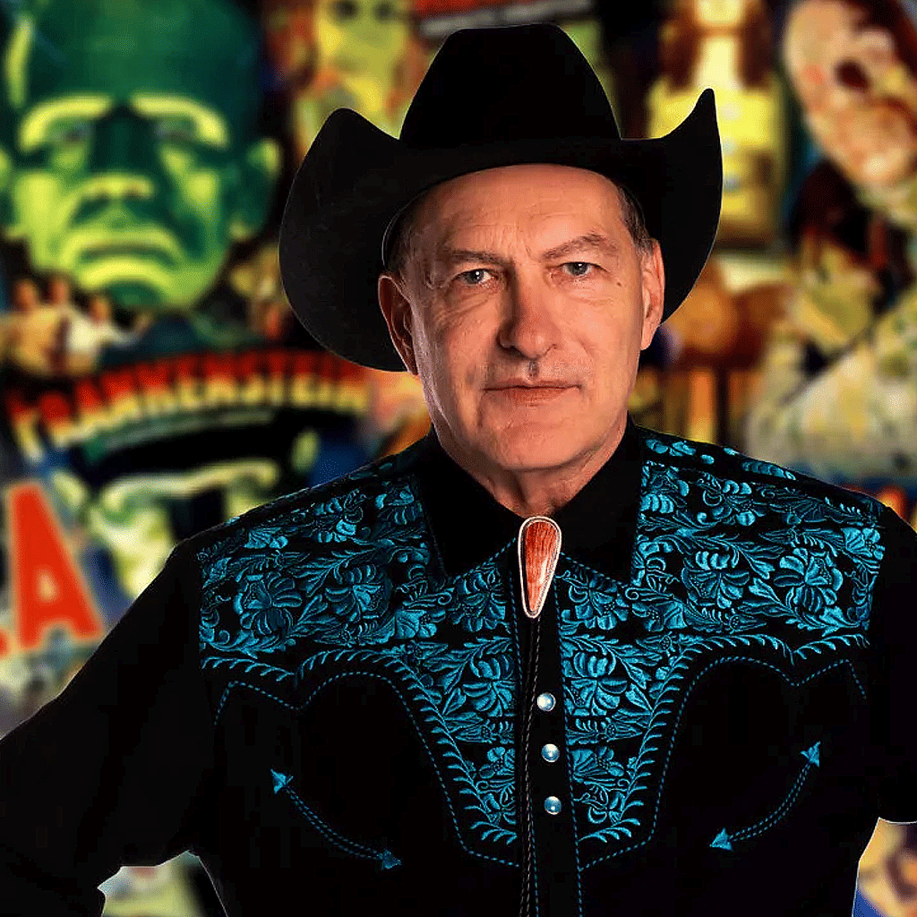 A man wearing a cowboy hat and a cowboy hat.