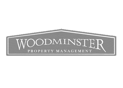 Woodminster property management logo.